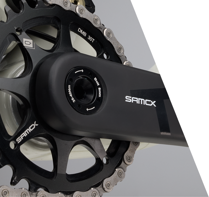 Person working in a factory setting with machinery and tools.